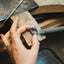 Shaping a signet ring in wax for casting in our Amsterdam studio