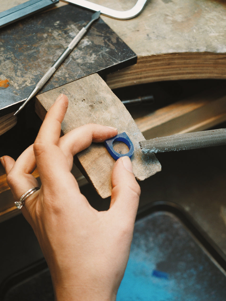 Shaping a signet ring in wax for casting in our Amsterdam studio